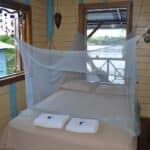 Cozy queen bed with mosquito net