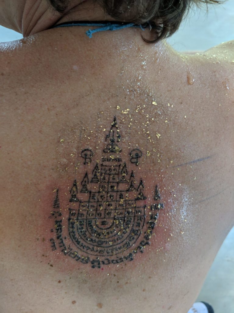 Finshed bamboo tattoo with gold leaf