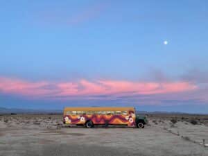 Funky and fun desert glamping space with retro school bus and unique rooms within an hour of Las Vegas and near Death Valley California.