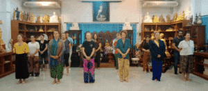 Sober yoga retreat leaders supporting group healing